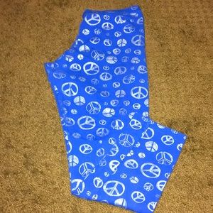 Peace signs leggings size 14 Girls blue pants EUC